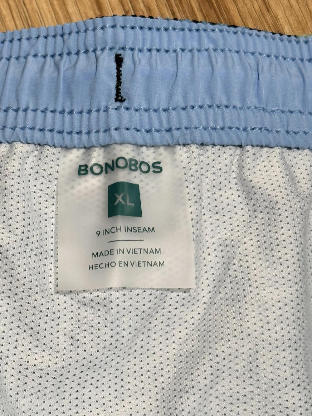 Bonobos Navy Tropical Print Swim Shorts with Green & Orange Accents